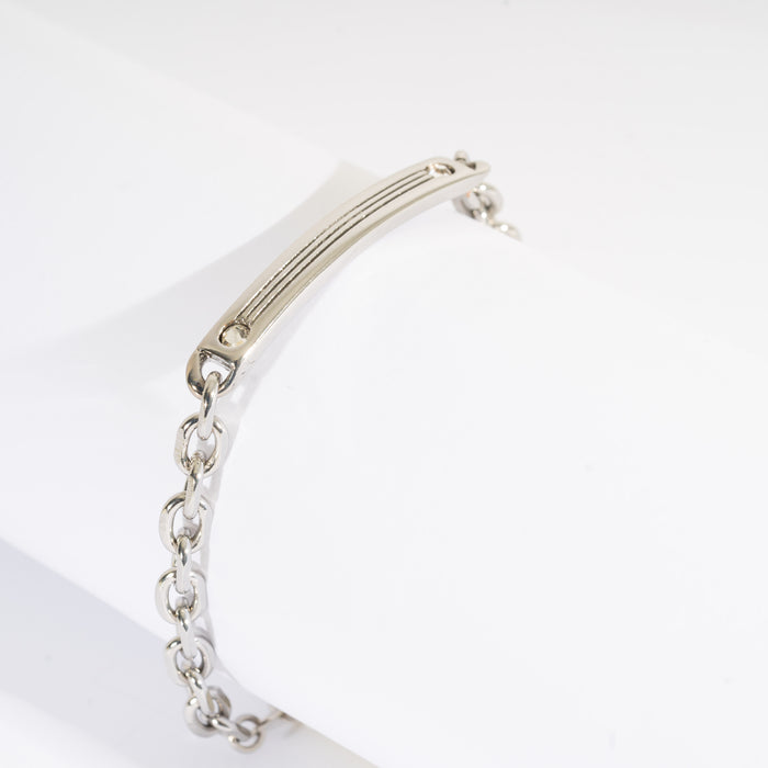 Bracciale centrale in metallo e due cristalli ai lati