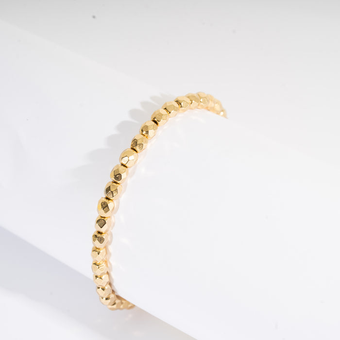 Bracciale con sfere in metallo irregolari in oro